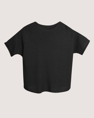 BATWING TOP WITH OPENWORK EMBELLISHMENTS - BLACK