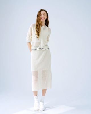ZIPPED FRONT KNITTED TOP - CREAM/ BLACK