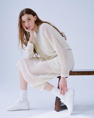 ZIPPED FRONT KNITTED TOP - CREAM/ BLACK