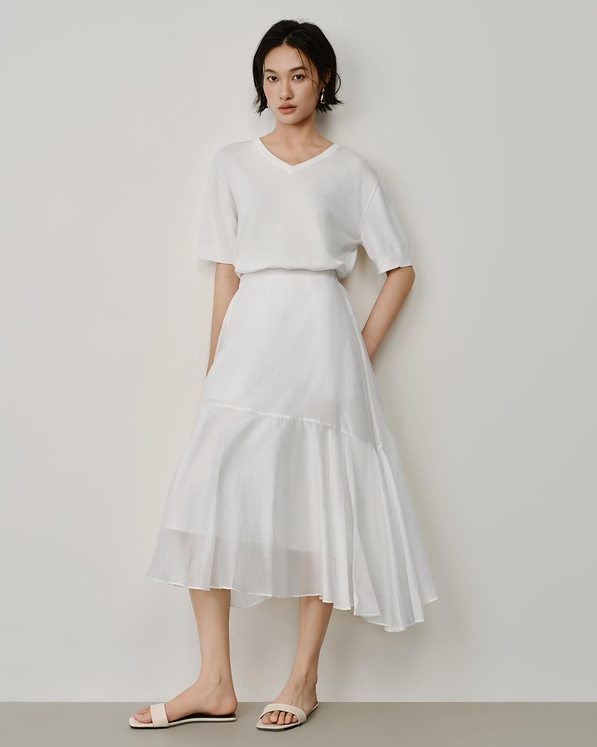 ASYMMETRIC HEM SKIRT - EGGSHELL