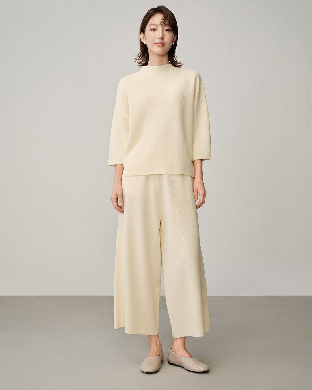 ASYMMETRIC MIXED-CABLE KNIT SWEATER - ALMOND