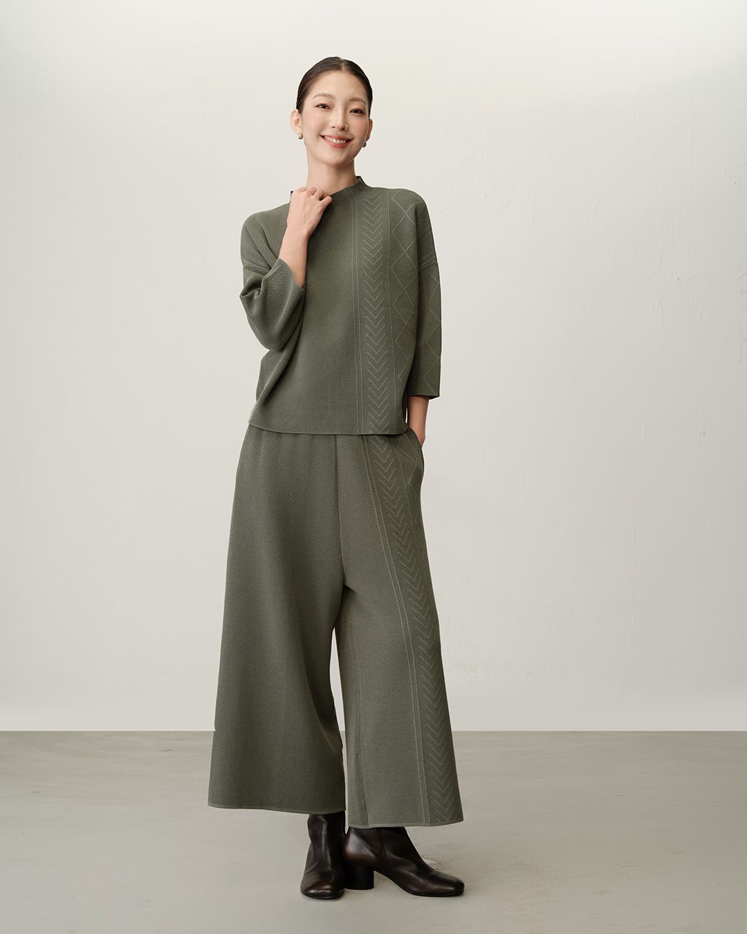 ASYMMETRIC MIXED-CABLE KNIT SWEATER - BASIL
