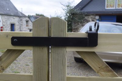 Fastener to padlock, two 450mm bolts, black.