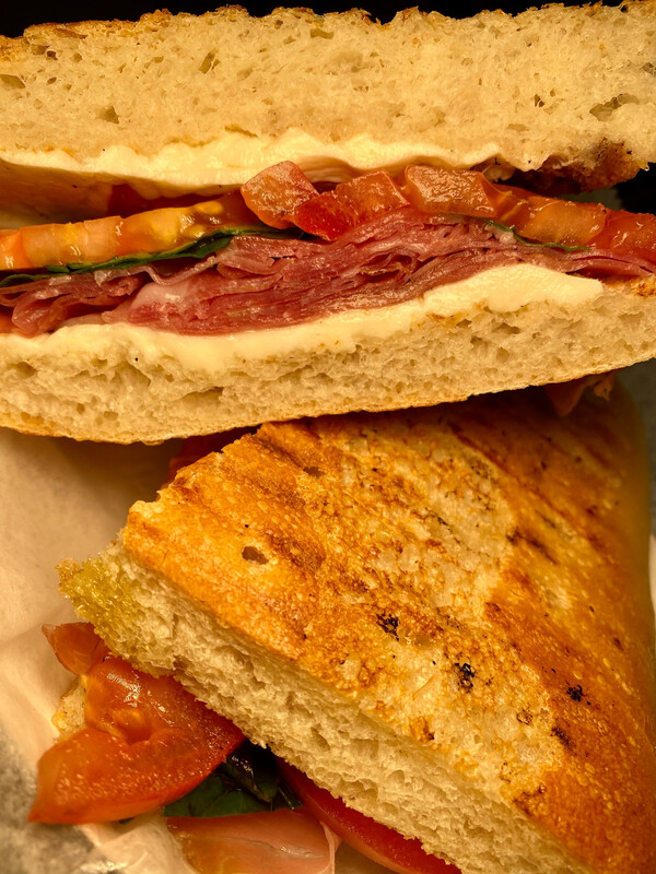 L- Panini   
Imported  prosciutto, fresh mozzarella, tomato, fresh basil, balsamic glaze