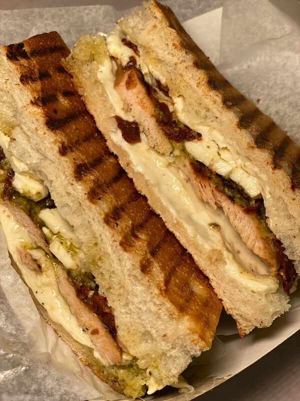 A- Panini 
grilled balsamic chicken, shaved reggiano parmigiana, fresh mozzarella, pesto, sundried tomatoes, balsamic glaze