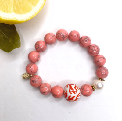 CORAL PINK HOWLITE WITH HANDPAINTED CERAMIC CORAL PALLINA