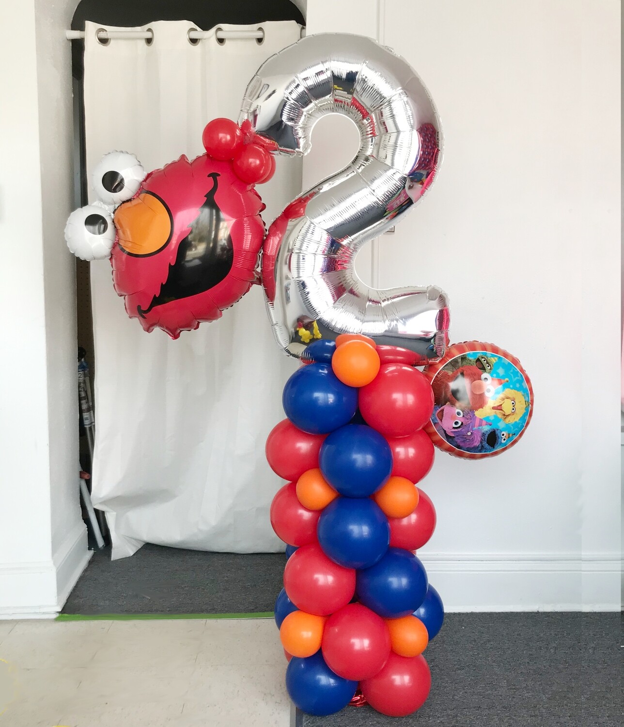 INDOOR Number topped half birthday balloon column with 2 foils