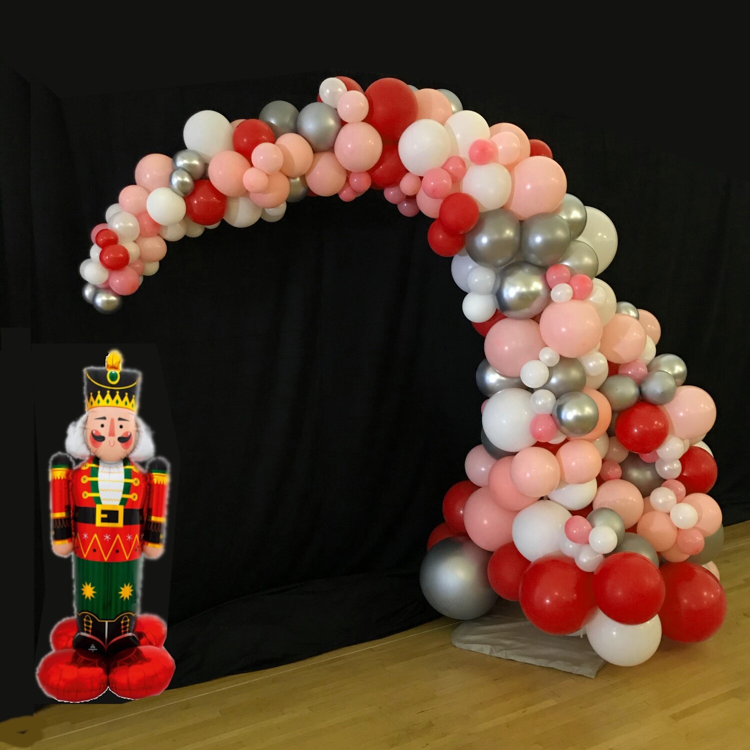 Nutcracker themed demi balloon arch