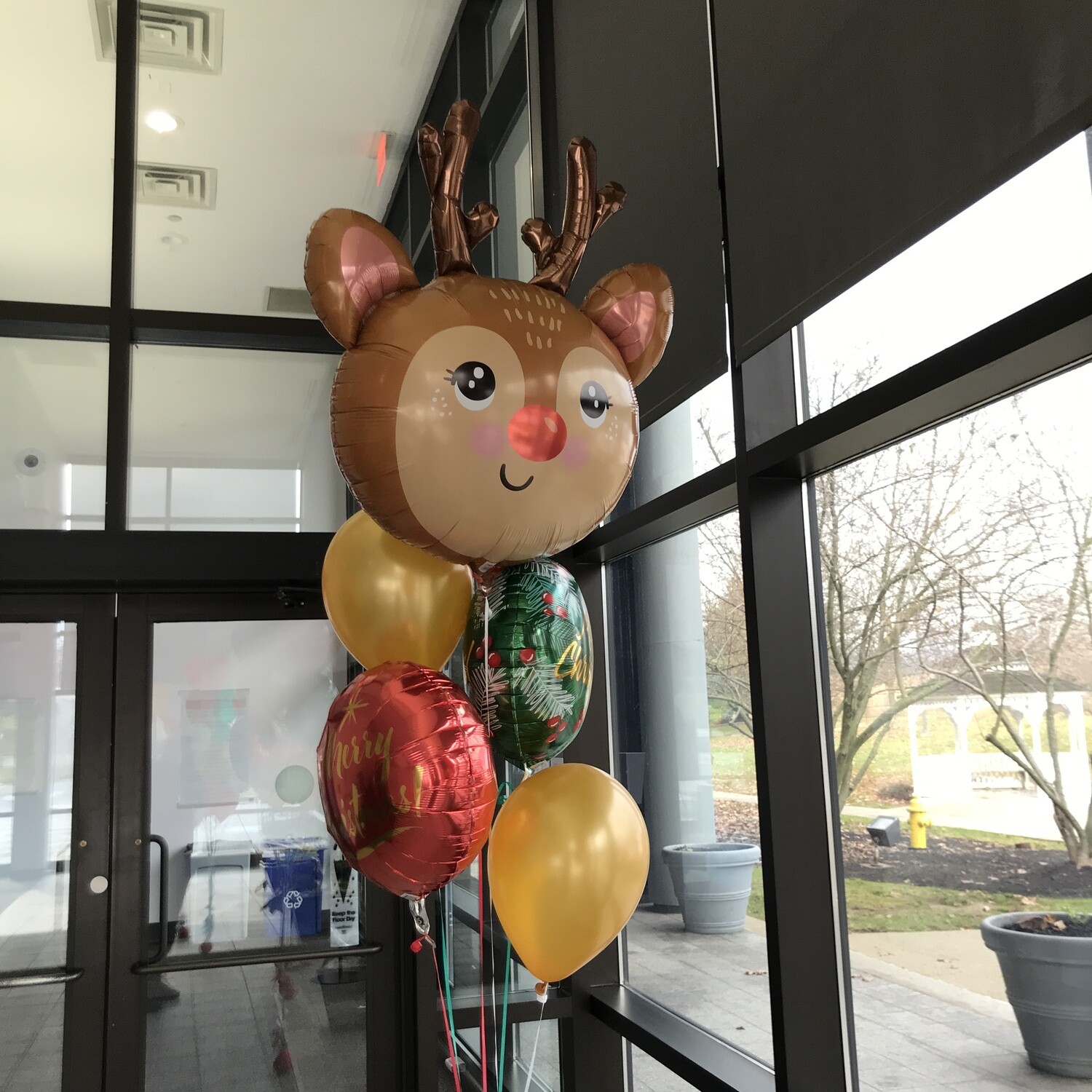 Merry Christmas helium balloon bouquet with reindeer