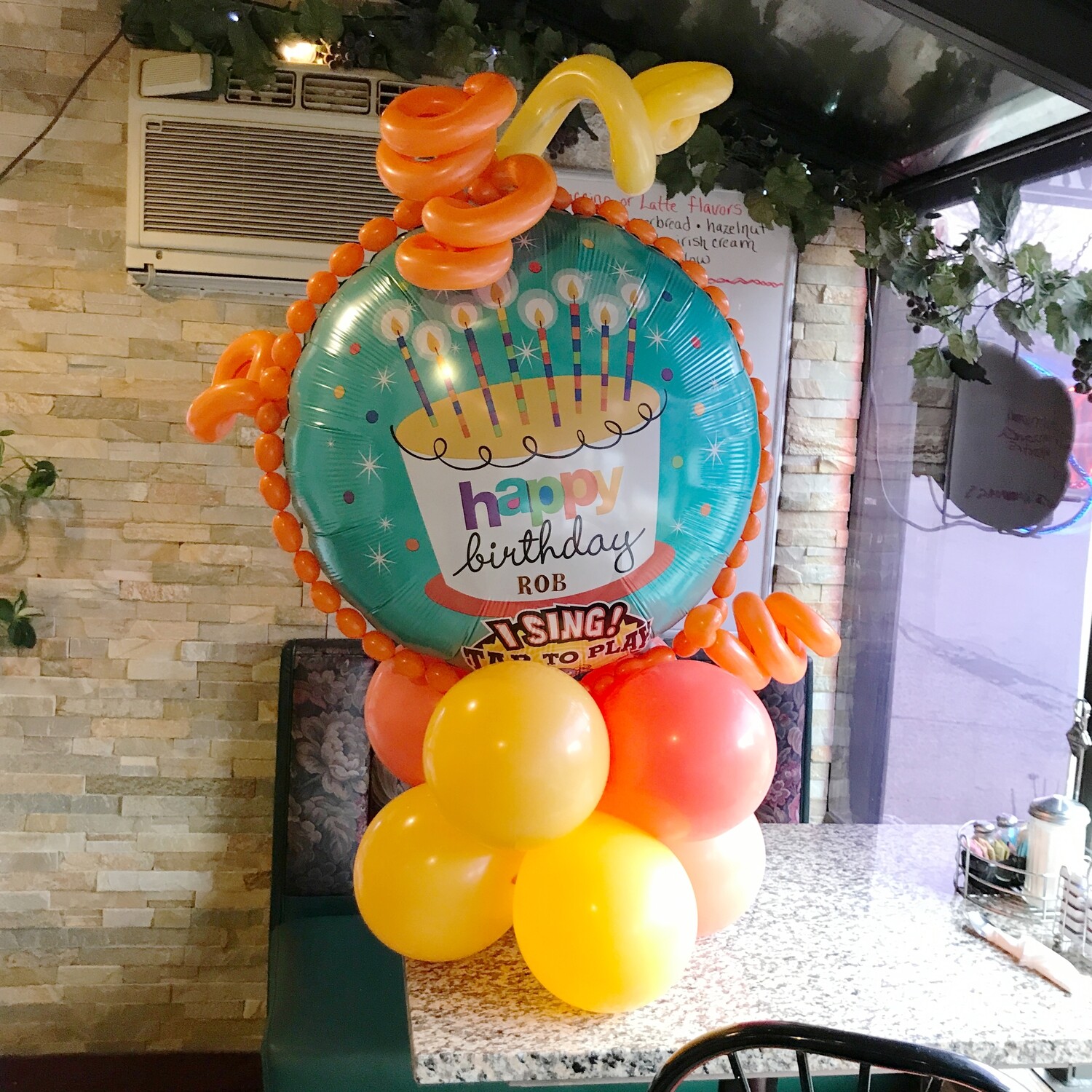 Giant singing balloon bouquet with curls, air filled