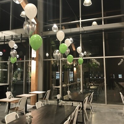 2 helium latex balloons inflated with a weight