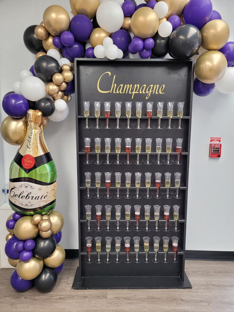 balloon decoration with wine wall rental (champagne not included)