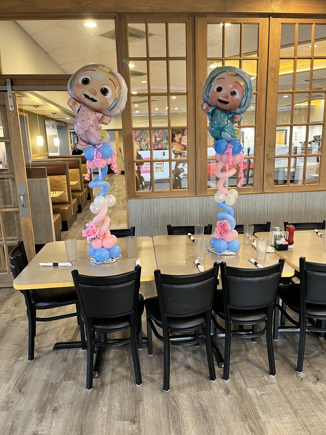 Character topped balloon, about 4 feet (indoors)