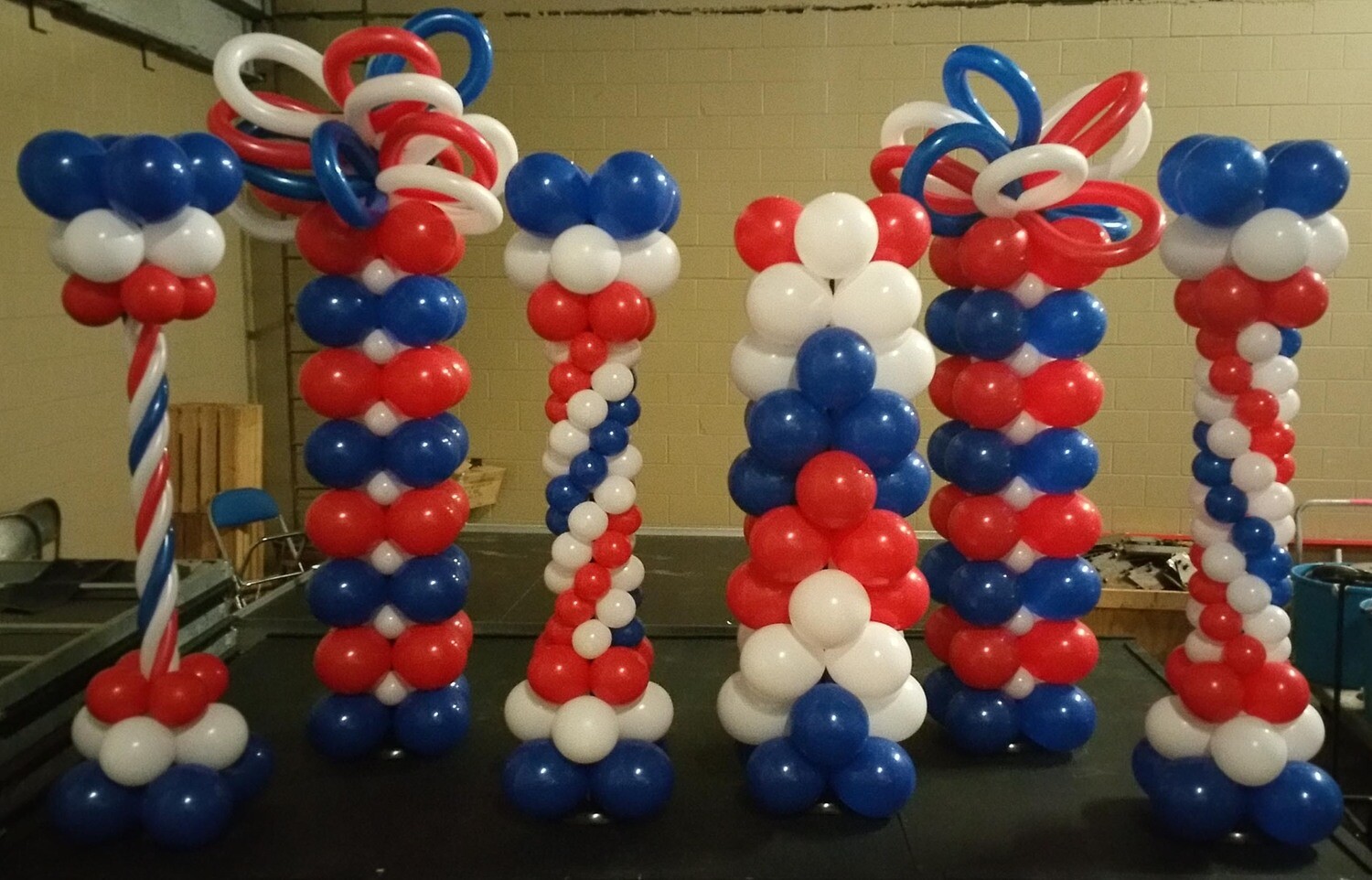 Crazy Fancy Red white and blue balloon columns for Phillies fans