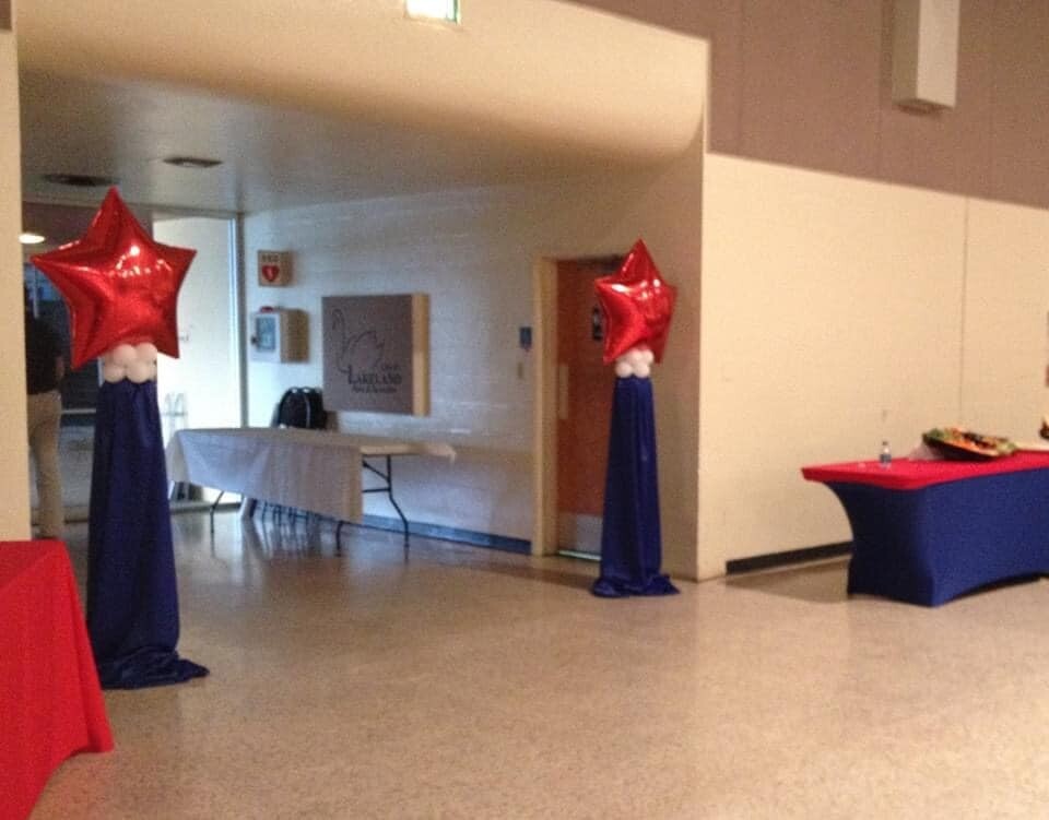 Star topped skirted Balloon column with drape rental, assembly included (indoors)