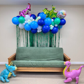 Dinosaur balloon garland with curtain (not helium, lasts longer)