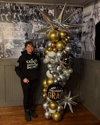 Glitzy star balloon column