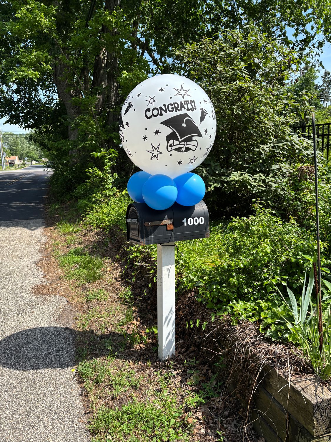 Mailbox giant congrats graduation balloon, inflated and installed