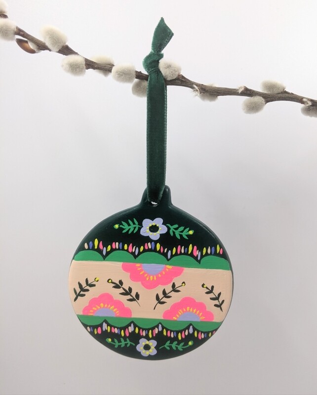 Ceramic disc hand painted folky pattern