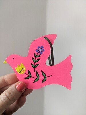 Neon pink small bird