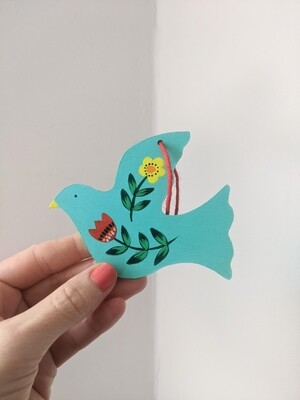 Small turquoise hand painted bird