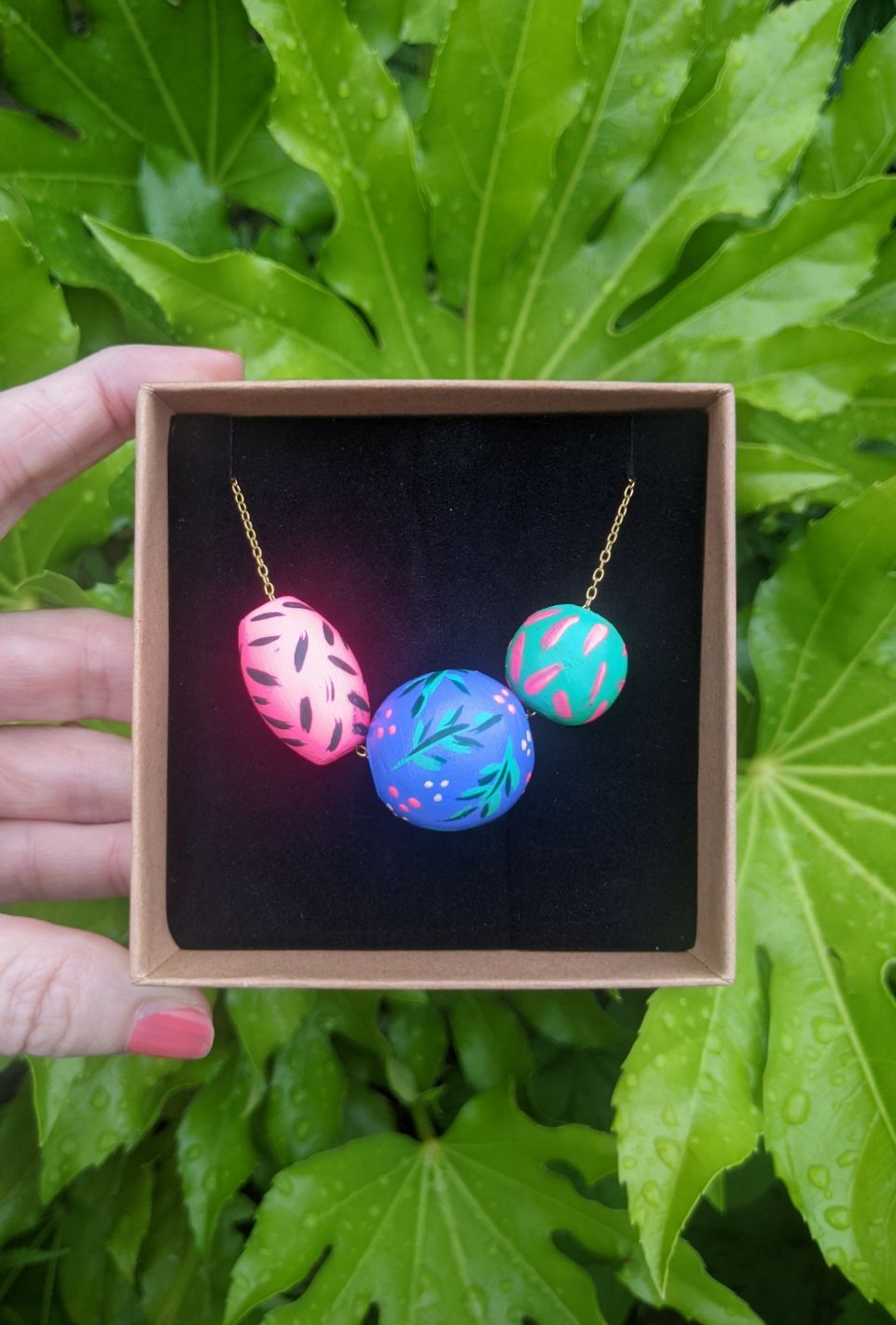 Beaded necklace hand painted blue, green and neon pink 