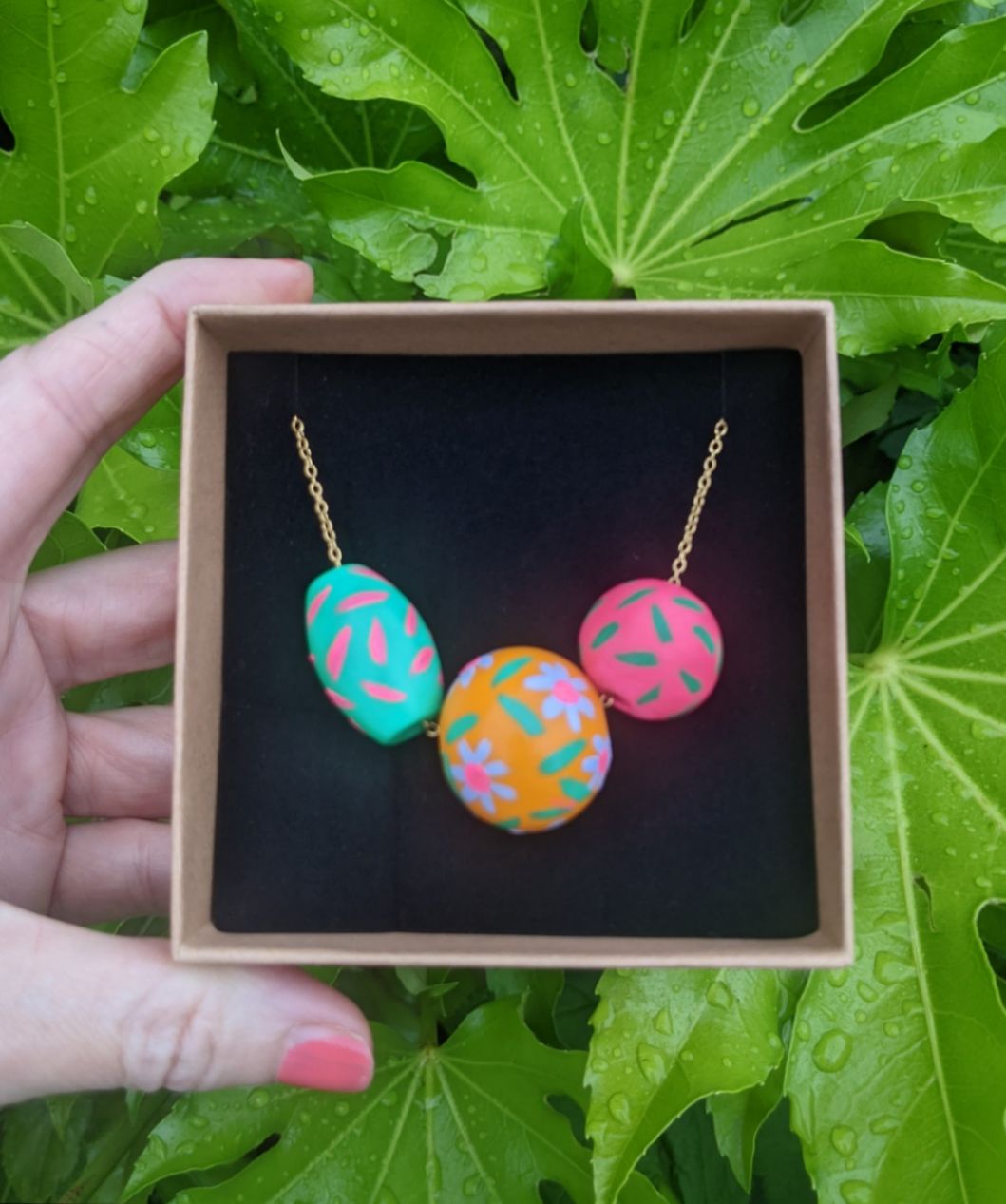 Beaded necklace hand painted green, orange and neon pink 