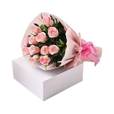 Dozen pink roses wrapped