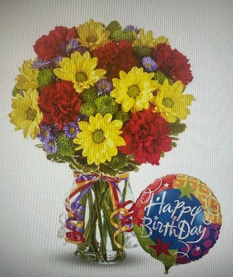 Celebration flowers with birthday balloon