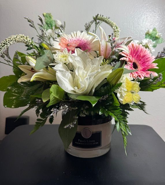 special of the day! flowers with fresh linen candle