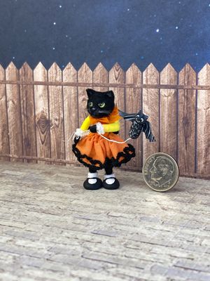​This 1:12 Scale Halloween Kitty Doll With Bat Friend