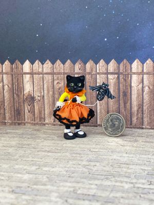 ​This 1:12 Scale Halloween Kitty Doll With Bat Friend