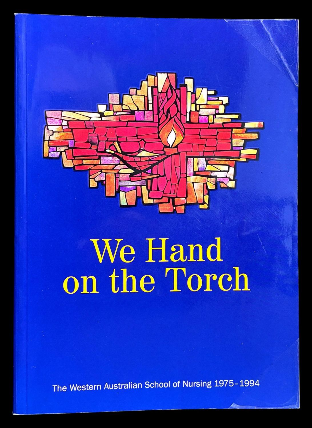 ‍We Hand on the Torch: A History of the Western Australian School of Nursing 1975-1994 by Shirley Perry and Susan Lutley
