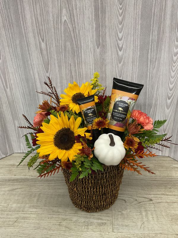 Round basket with Camille Beckman lotions Round basket with Camille Beckman lotions