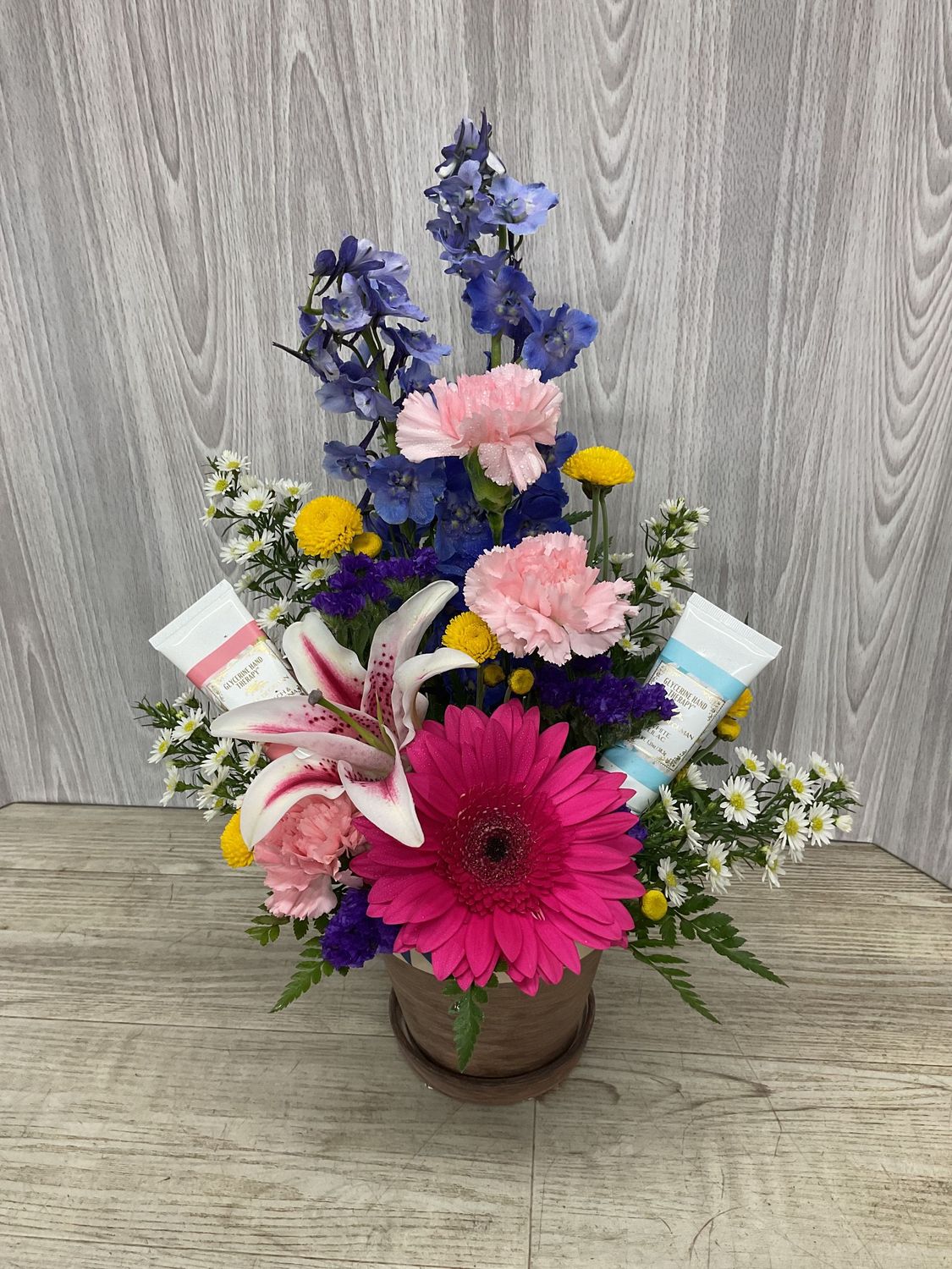 Pot of Flowers with Camille Beckman lotions