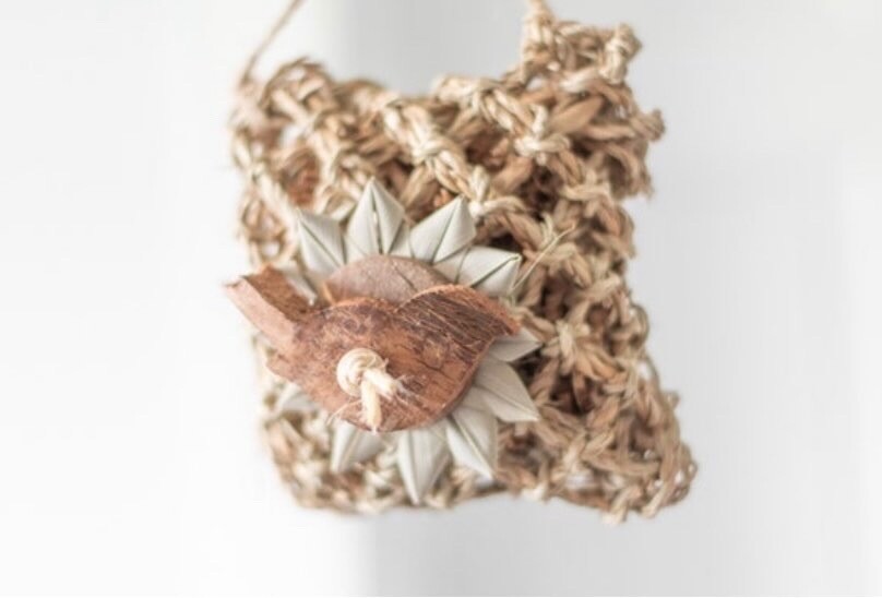 Robin Foraging Toy for Small Birds - In this toy, you will find Natural woven seagrass mat, palm leaf, coconut shell, coconut husk, wooden beads, sisal twine, & jute rope by Little Dinos Natural Bird