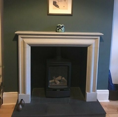 Bolection with mantle and Vogue Gas stove