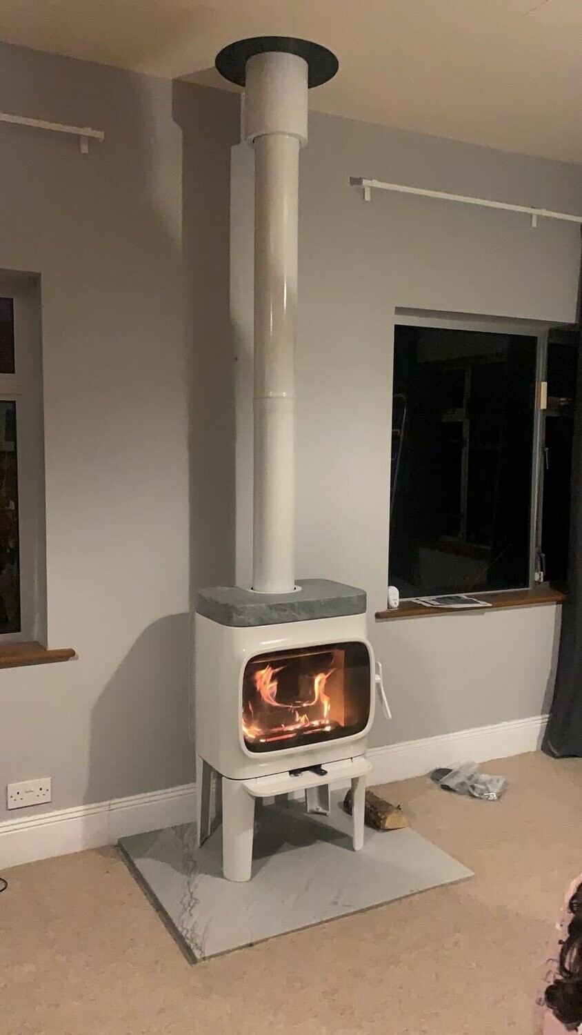 White Jotul F305 within long legs and soapstone top