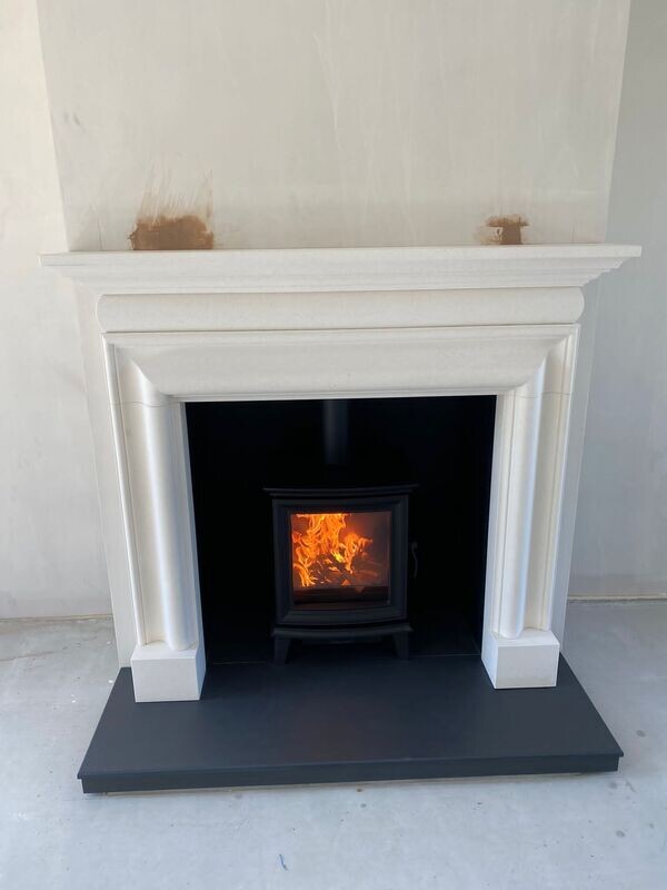 Valencia surround with Chesterfield stove