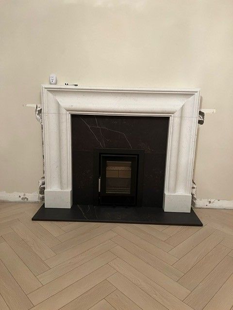 Bolection Fireplace, Dekton Kelya Insert & Hearth & Mourne Eco 400