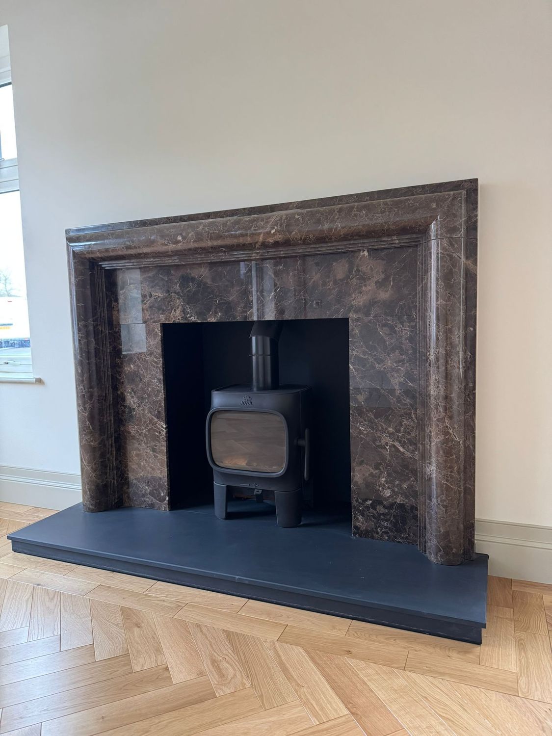 Dark Emperardor Marble Fireplace & Jotul F105 Wood Burning Stove