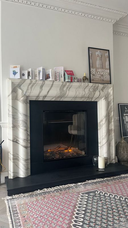 Large Calacatta Bolection & E-Reflex Electric Fire