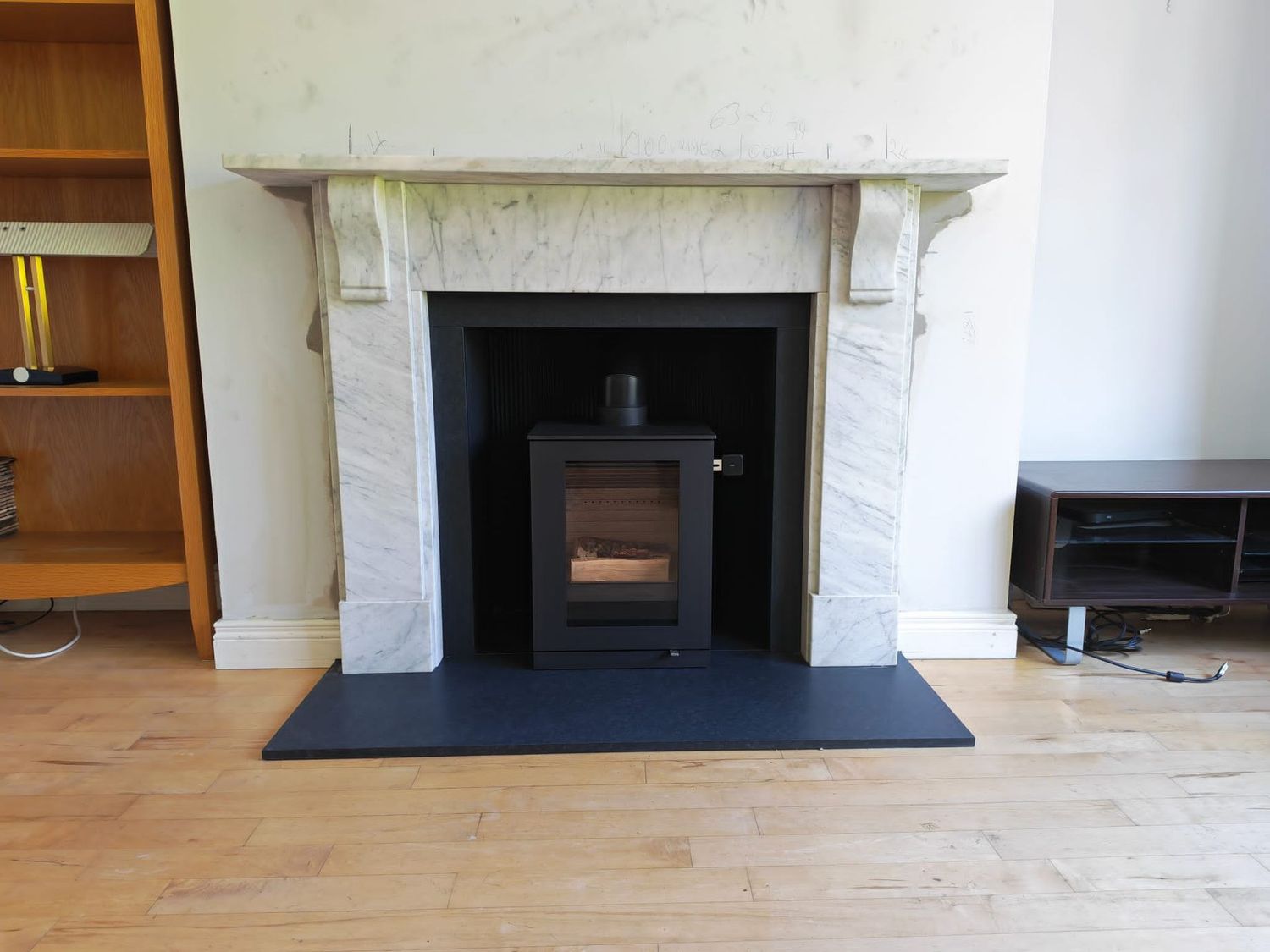 Antique surround & Rais Q-Tee Stove