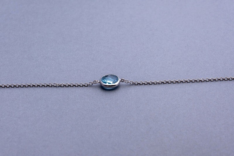 9ct gold Bracelet with Swiss blue Topaz