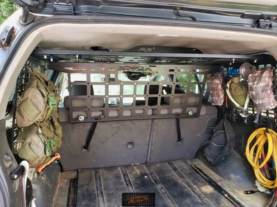 Nissan Xterra Gen 2  Attic storage with cargo barrier