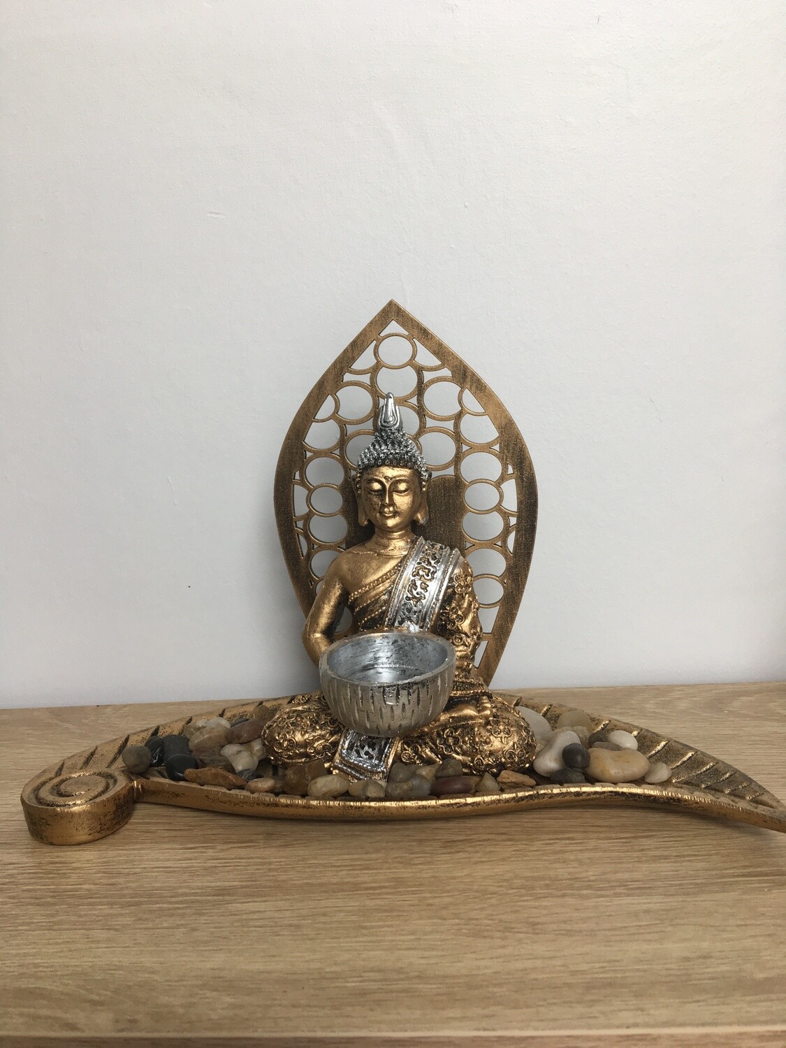 Buddha Gold Candle Holder on leaf