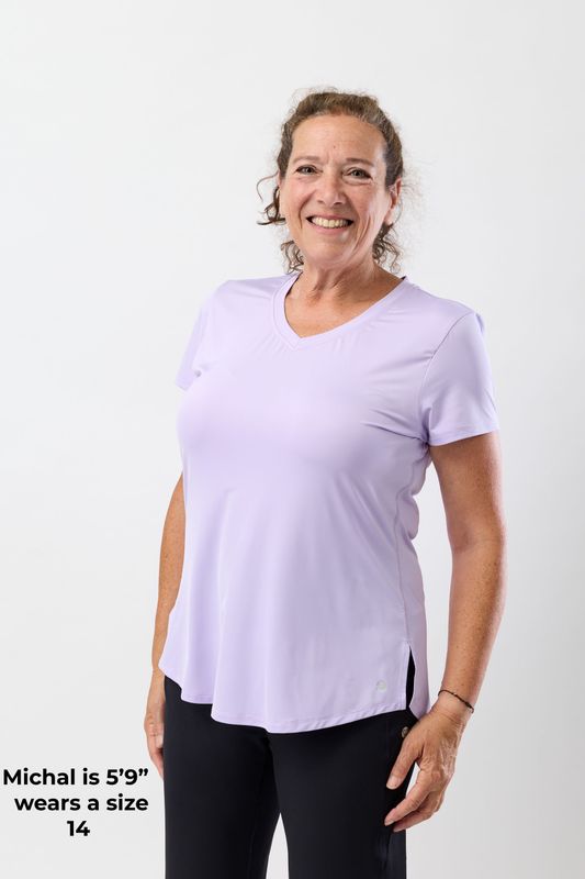 Women’s V-neck Bum Covering Stretchy Moisture Wicking Top- Peaceful Lilac Women’s V-neck Bum Covering Stretchy Moisture Wicking Top- Peaceful Lilac