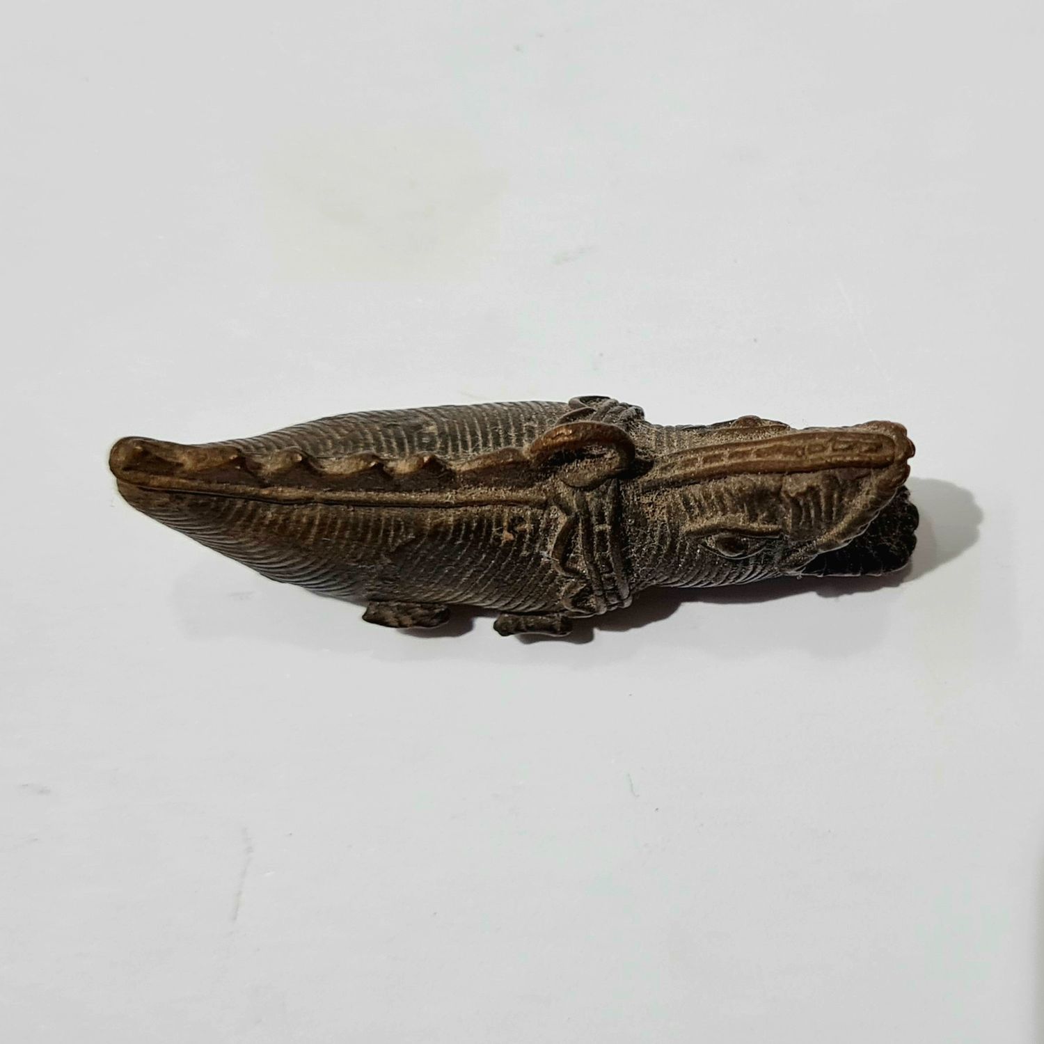 FISH SHAPED BRONZE FIGURE