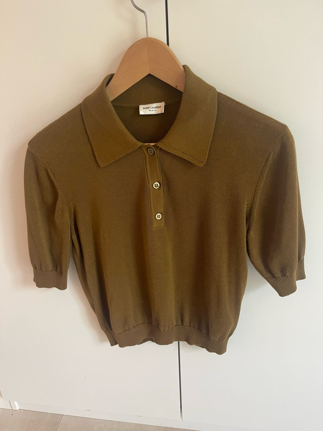 Polo en maille st laurent ok taille 36 parfait état .