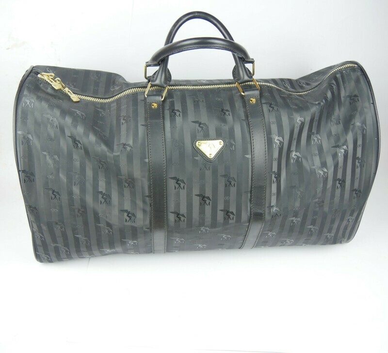 Maison Mollerus Reisetasche in Schwarz-Gold / Zustand: 4 – guter Zustand mit wenig Gebrauchsspuren
